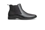Black leather Chelsea boots with elastic side panels and a rugged tan rubber sole.