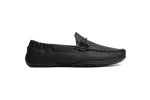 Close up of supple black leather loafers with moccasin toe stitching
