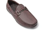 Close up of supple brown leather loafers with moccasin toe stitching