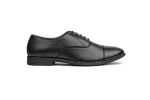 Close up of black leather oxford dress shoes with discreet brogue perforations