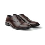 Close up of classic brown leather oxford shoes with lace-up detailing