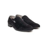 Close up of plush black velvet leather loafers with grosgrain ribbon