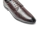 Brown leather lace-up derby shoes with white contrast sole.