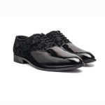 These black party wear shoes have intricate black embroidery. They are perfect for adding elegance to any attire.